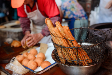 Freshly cooked doughnut sticks