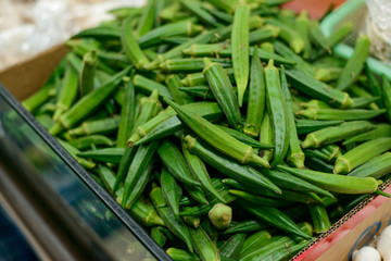 Tray of fresh okra pods