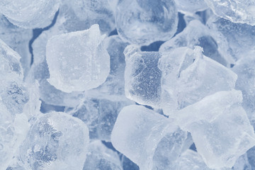 Frozen ice cubes for cocktails. Background with ice cubes