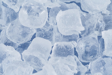 Frozen ice cubes for cocktails. Background with ice cubes