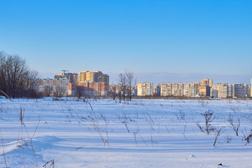 Fototapeta premium winter city in the morning sunrise
