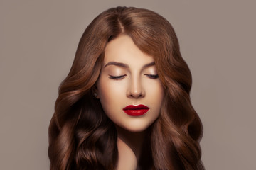 Pretty redhead woman. Beautiful redhead girl with wavy haircut and perfect makeup, cute face closeup