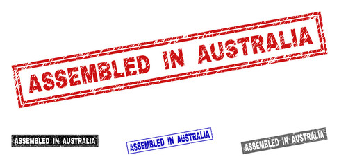 Grunge ASSEMBLED IN AUSTRALIA rectangle stamp seals isolated on a white background. Rectangular seals with distress texture in red, blue, black and gray colors.