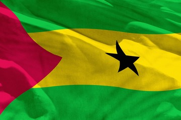 Waving Sao Tome and Principe flag for using as texture or background, the flag is fluttering on the wind
