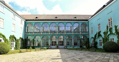 Dacice castle courtyard with glass covered arcades
