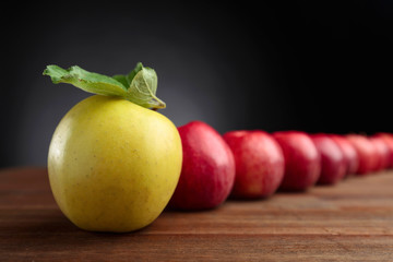 Juicy apples on a wooden table.