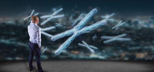 Businessman in front of a Group of chromosome with DNA inside isolated on a background 3d rendering