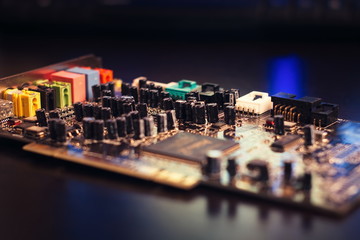 Dusty old sound card close-up. Shot low key, macro and selective focus. (retro lens)