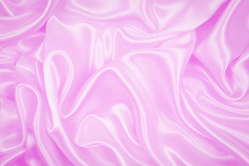 Smooth elegant pink silk or satin texture can use as abstract background, beautiful fabric