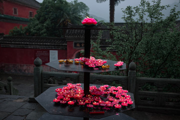 Lotus candles in a buddhist taoist wushu Temple China