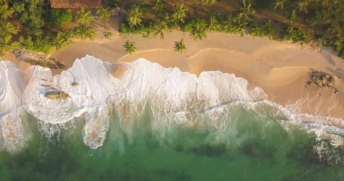 Ocean waves at sunset. Sri Lanka, Drone footage.