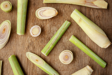 lemongrass slices on wood background.