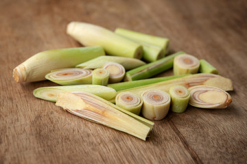 lemongrass slices on wood background.