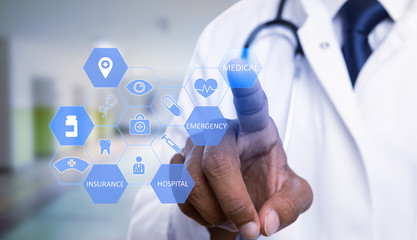 Close-up of physician choosing medical text button.