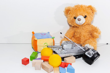 Toy tools and cubes on a light background. Toy for children