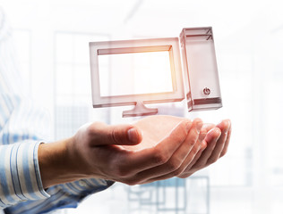 Computer and internet security concept presented by icon in male palm. Mixed media