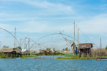 fisherman's village in Thailand with a number of fishing tools called "Yok Yor", Thailand's traditional fishing tools that made form bamboo and fishing net ,Thailand.