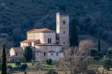 Fototapeta na wymiar The beautiful Abbey of Sant'Antimo surrounded by the Sienese countryside, Montalcino, Tuscany, Italy