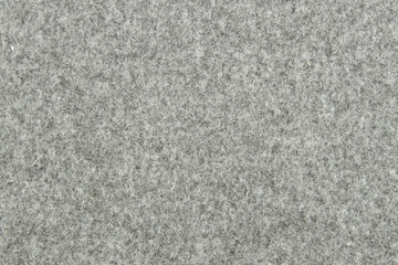 Fototapeta premium Fabric for sewing military uniforms. Warm Army or Soldier Coat. Rough fabric texture. Background.