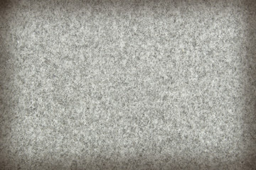 Fabric for sewing military uniforms. Warm Army or Soldier Coat. Rough fabric texture. Background.