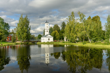 Fototapeta premium White watch tower glowing in summer sunshine