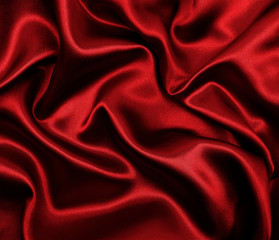 Naklejka na ściany i meble Smooth elegant red silk or satin luxury cloth texture as abstract background. Luxurious valentines day background design