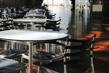 Round table lined in sunny rooms