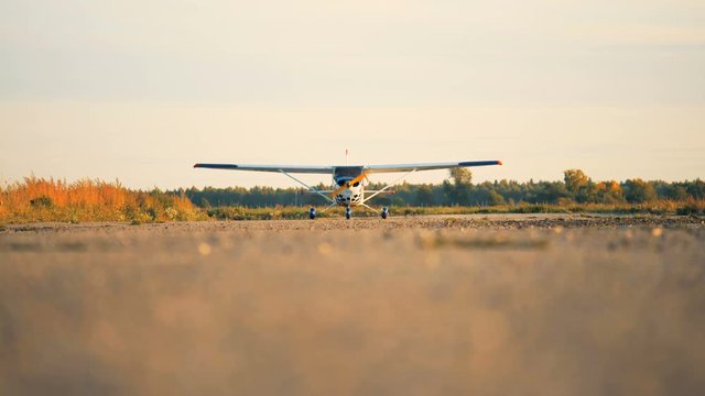 One plane on an airfield, close up.