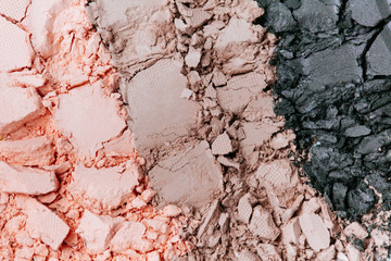 A broken pink gradient colored eye shadows isolated on a white background. Top view, flat lay. Copy space for your text