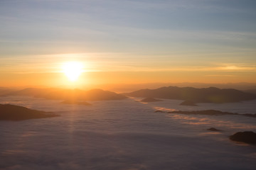 Fototapeta na wymiar Dramatic sunset and sunrise over mountain morning twilight evening sky.