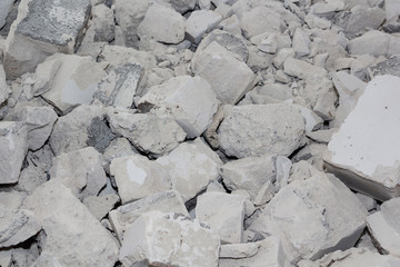 Fragments of used broken concrete. Background,the consequences of the earthquake