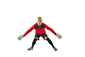 Goalkeeper ready to save on white studio background. Soccer football concept