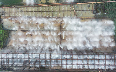 Industry factory manufacturing with pond of wastewater treatment
