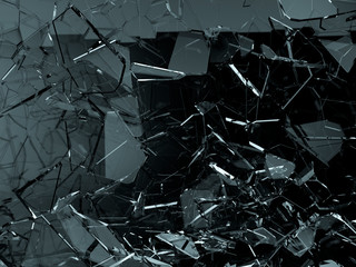 Pieces of glass broken or cracked on black