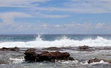 Stunning indian ocean waves at the beaches on the paradise island seychelles