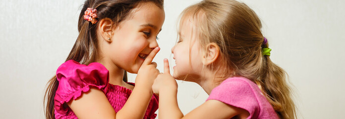 Two little girls sisters hugging © Angelov