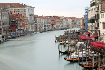 Fototapeta na wymiar wide waterway called Canal Grande in Venice with long exposure
