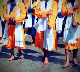 Men of the Sikh religion during a march on the barefoot road