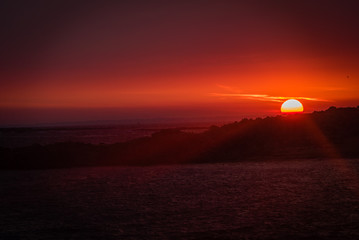 Red sunset in Erdeven in Bretagne region in France