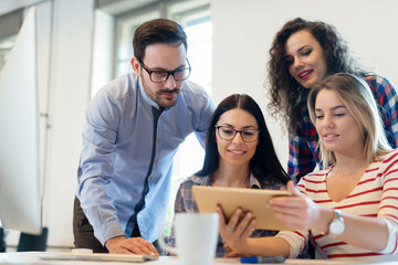 Creative coworkers working in office