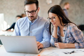 Picture of architects working together in office