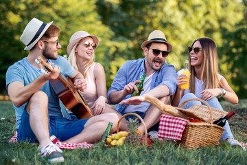 Group of happy friends having fun outdoors