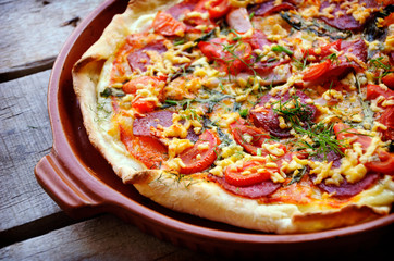 Delicious italian pizzas served on wooden table