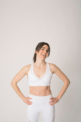 Girl with a sports outfit and white background