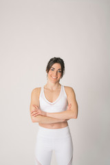 Girl with a sports outfit and white background