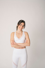 Girl with a sports outfit and white background