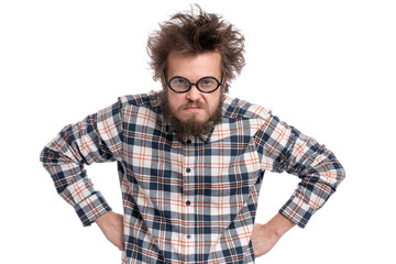 Crazy serious bearded man in eye Glasses with displeased expression, with both hands on hips, isolated on white. Guy in plaid shirt with funny Haircut looking with anger. Emotions and signs concept