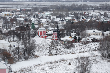 Suzdal city in winter. Top view from the bell tower of the Rizopolozhensky monastery. Gold ring of Russia