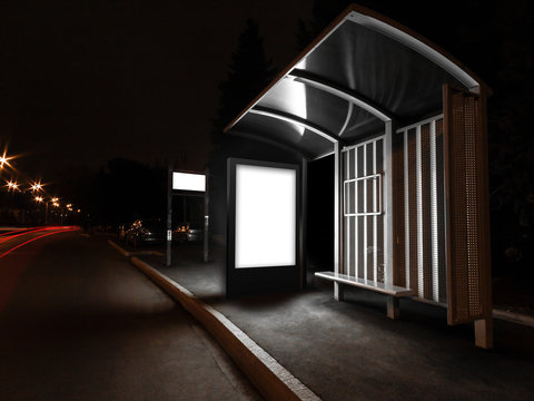 Blank advertising light box on bus station at night, mock up