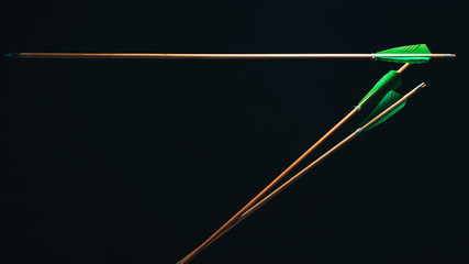 Three wood arrow one flying . Beautiful  smog background. Medieval weapons are handmade.